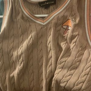 brown and orange mushroom vest